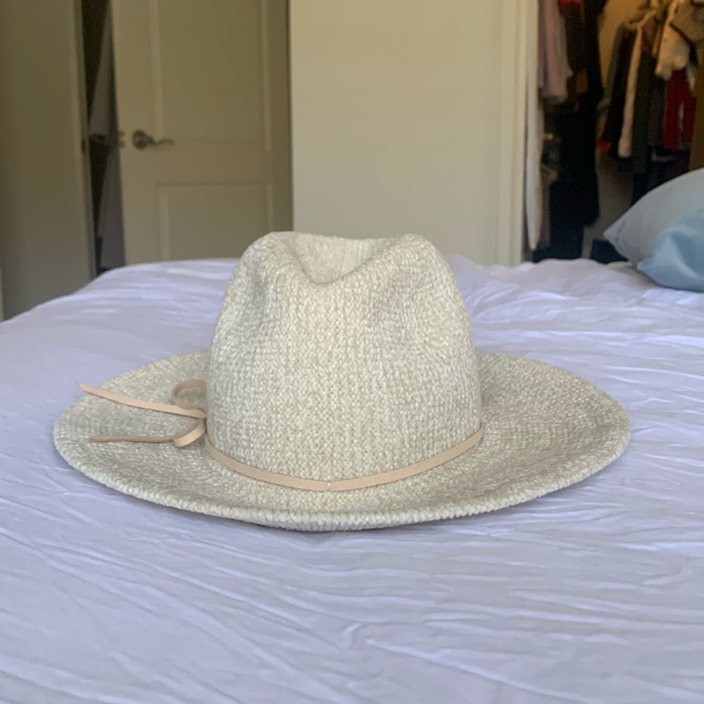 Cream colored hat. 23 inches circumference.
